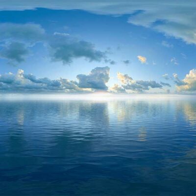 ALIPRINT Horizon océanique avec ciel bleu et nuages reflétant sur l'eau, créant une atmosphère sereine. Paysage marin parfait pour fond d'écran apaisant. Algerie